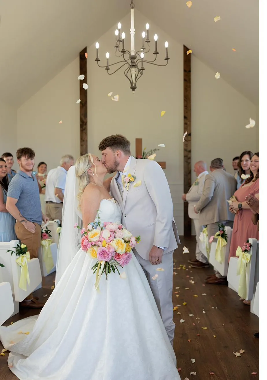A moment from Bailey and Titus's wedding day at Gateley Hill Gardens
